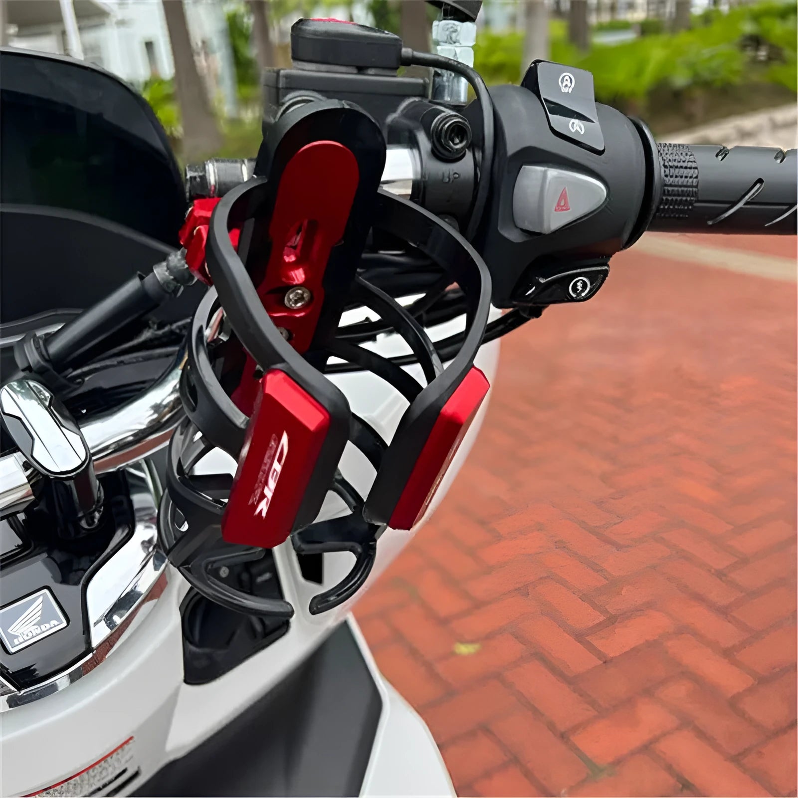 Modified water bottle cage for Honda X-ADV750 and XADV150 scooters in six colour options