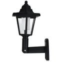 Black hexagonal solar-powered LED wall light for outdoor garden and security lighting