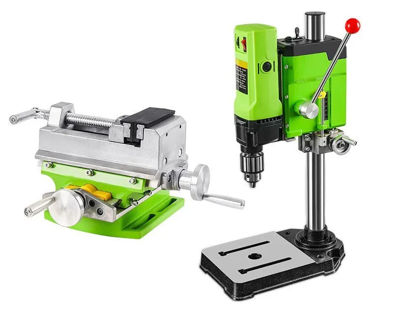 Mini bench drill and milling machine on a workbench with cross bench pliers.