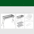 Large stainless steel portable folding barbecue oven set up outdoors.