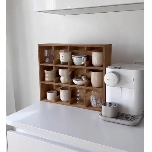 Square solid wood cup storage rack with multiple grids in birch meridian colour.