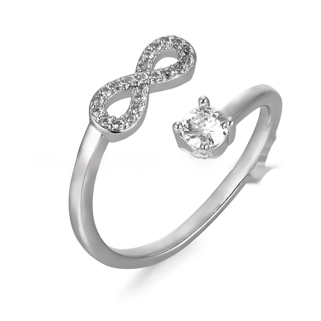 Geometric open band ring with a letter charm and inlaid zircon detail in gold colour.