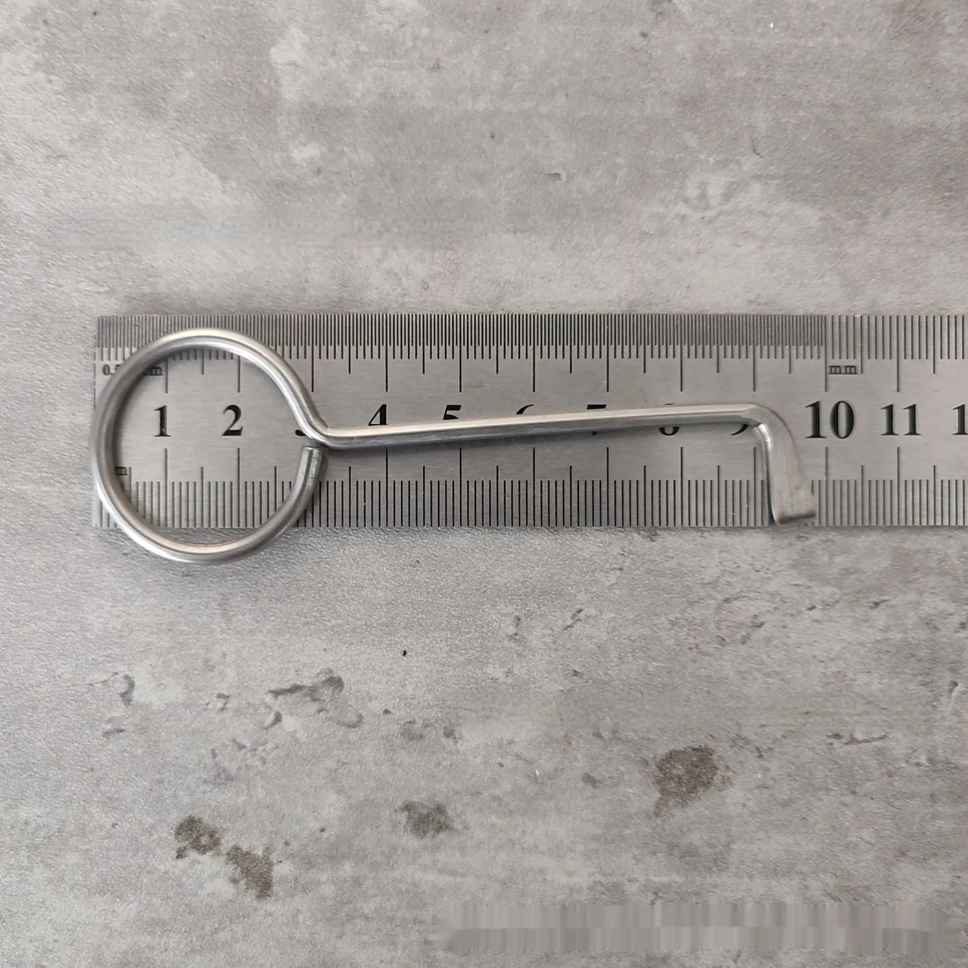 Two metal alloy wrench tools from a portable 2-piece set for household and vehicle maintenance.