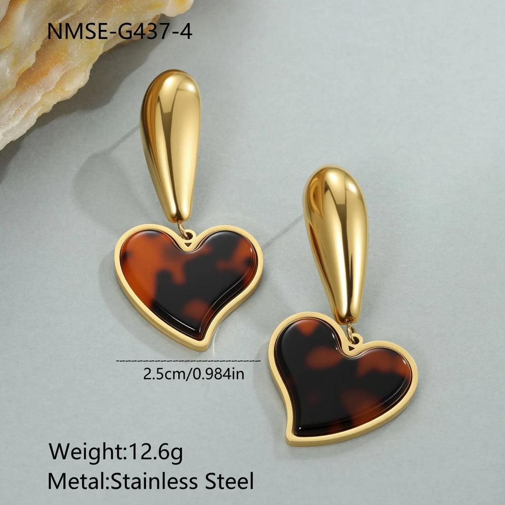 Tortoiseshell resin hawksbill colour earrings with 18K gold plating on stainless steel, showing heart and flower geometric designs