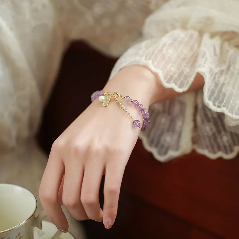 Natural lavender amethyst crystal bracelet with animal or zodiac motif for women.