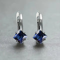 Women's copper earrings with diamond design featuring zircon inlaid stones in blue, colour, and green options