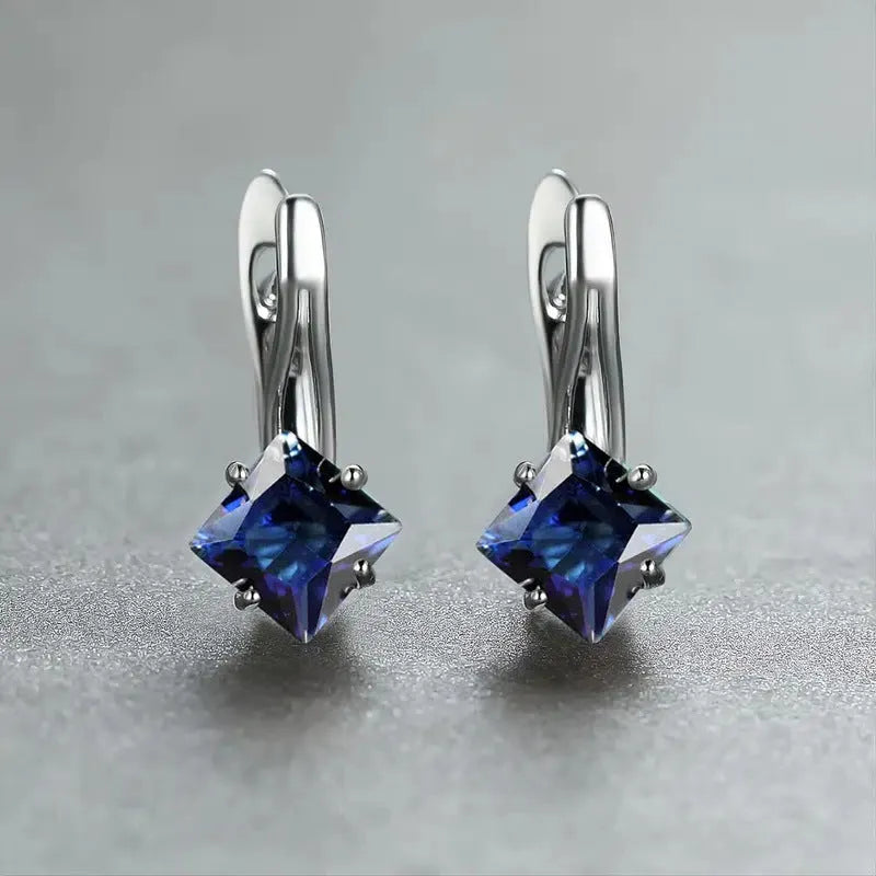 Women's copper earrings with diamond design featuring zircon inlaid stones in blue, colour, and green options