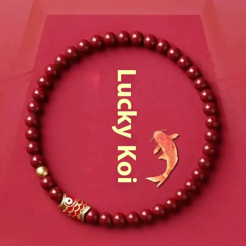 Handmade natural cinnabar bracelet with koi fish and golden ball charms in national style