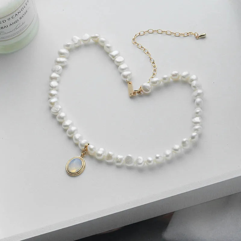 Adjustable sterling silver pearl necklace with irregular geometry and extension chain