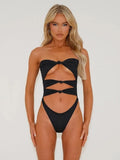 Women's one-piece swimsuit with hollow out design in nylon fabric for swimming.