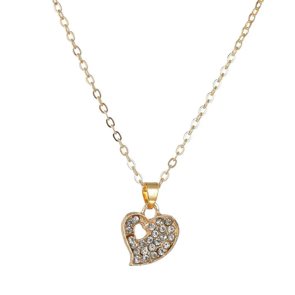 Women's love jewellery set with earrings, pendant and bracelet in gold colour with water drop and bell patterns