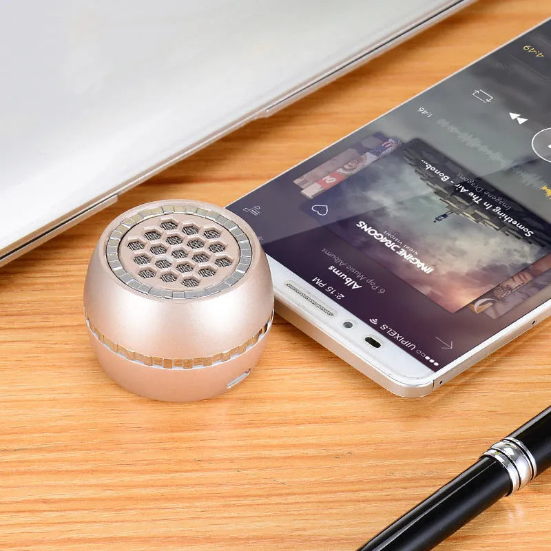 Universal external amplifier speaker in engineering plastic box, shown in black, local gold, and rose gold colour options.