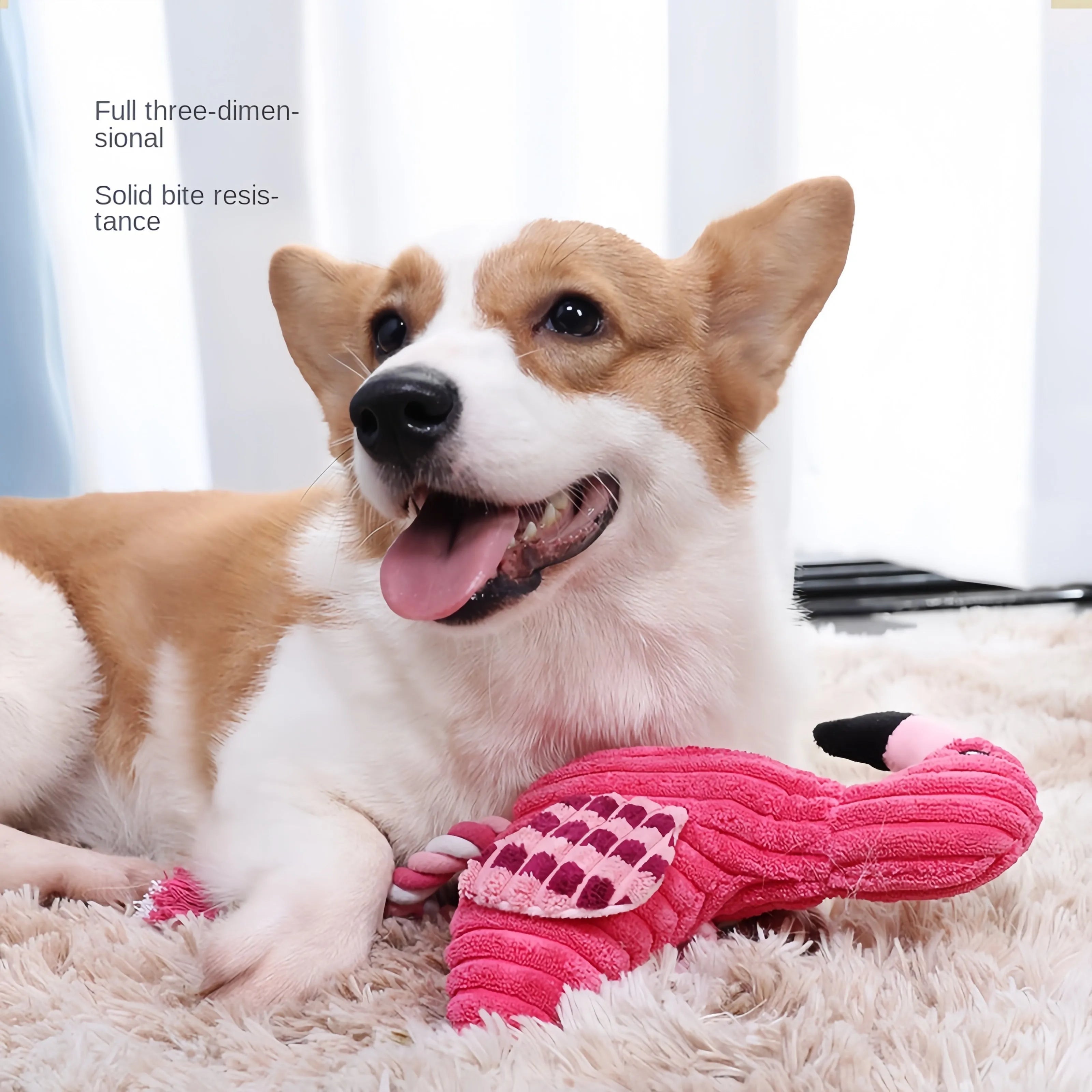 Pink animal-shaped corduroy plush dog toy with squeaker on a white background
