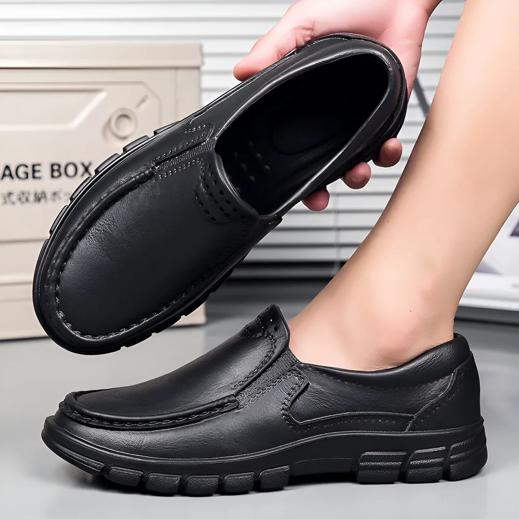 Men's black waterproof platform slip-on shoes with artificial leather upper and mid-heel design