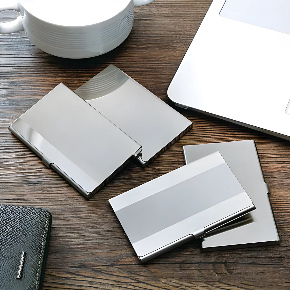 304 stainless steel business card case with laser-sculpted geometric pattern showing horizontal format
