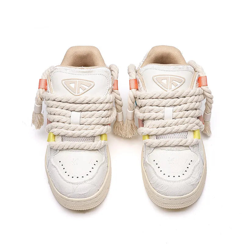 Creamy white retro skateboard shoes with vintage lace styling and low-top design