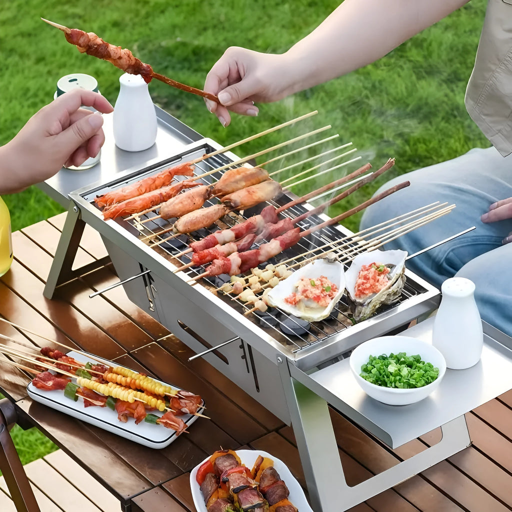 Small foldable portable charcoal grill for outdoor barbecues
