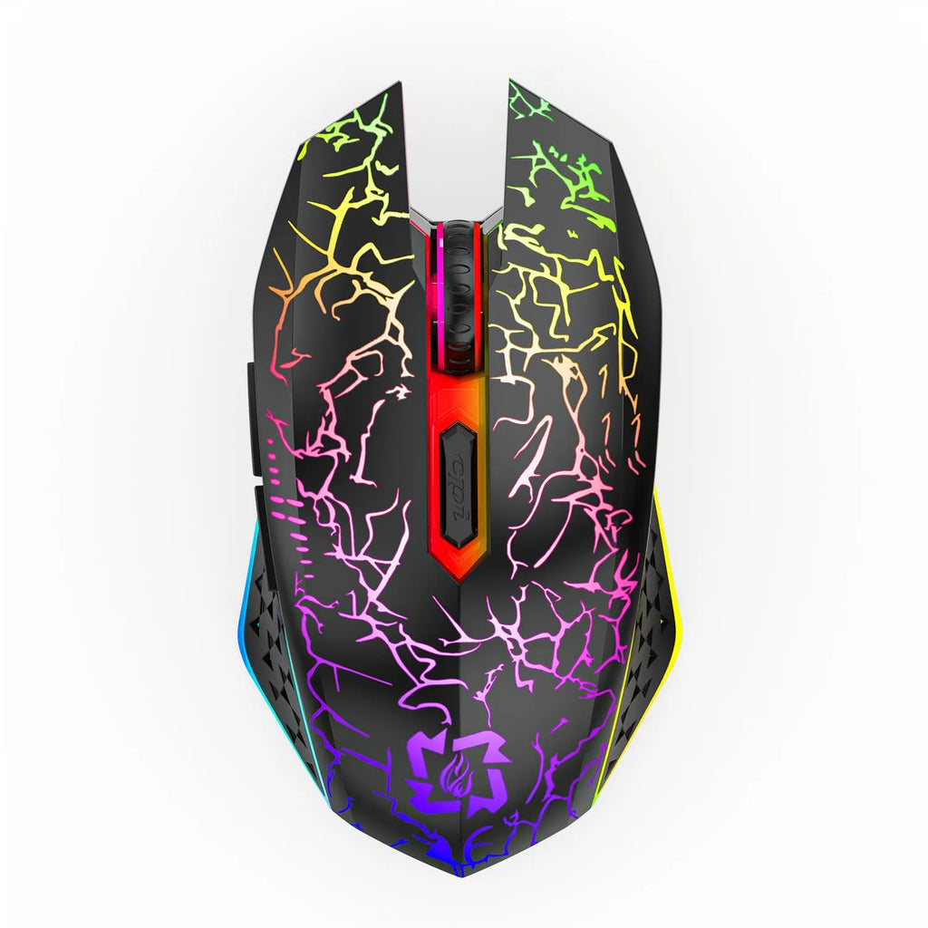 Black and white wireless gaming mouse with breathing lights and USB charging cable on desktop