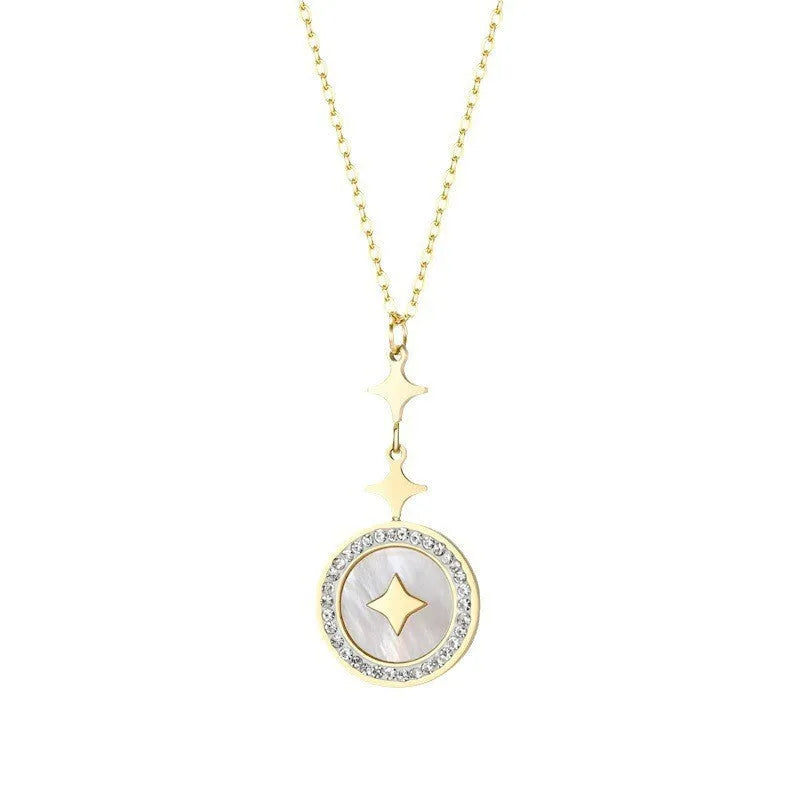 Close-up of a hexagonal six-pointed star titanium steel pendant necklace on a gold O-ring chain.