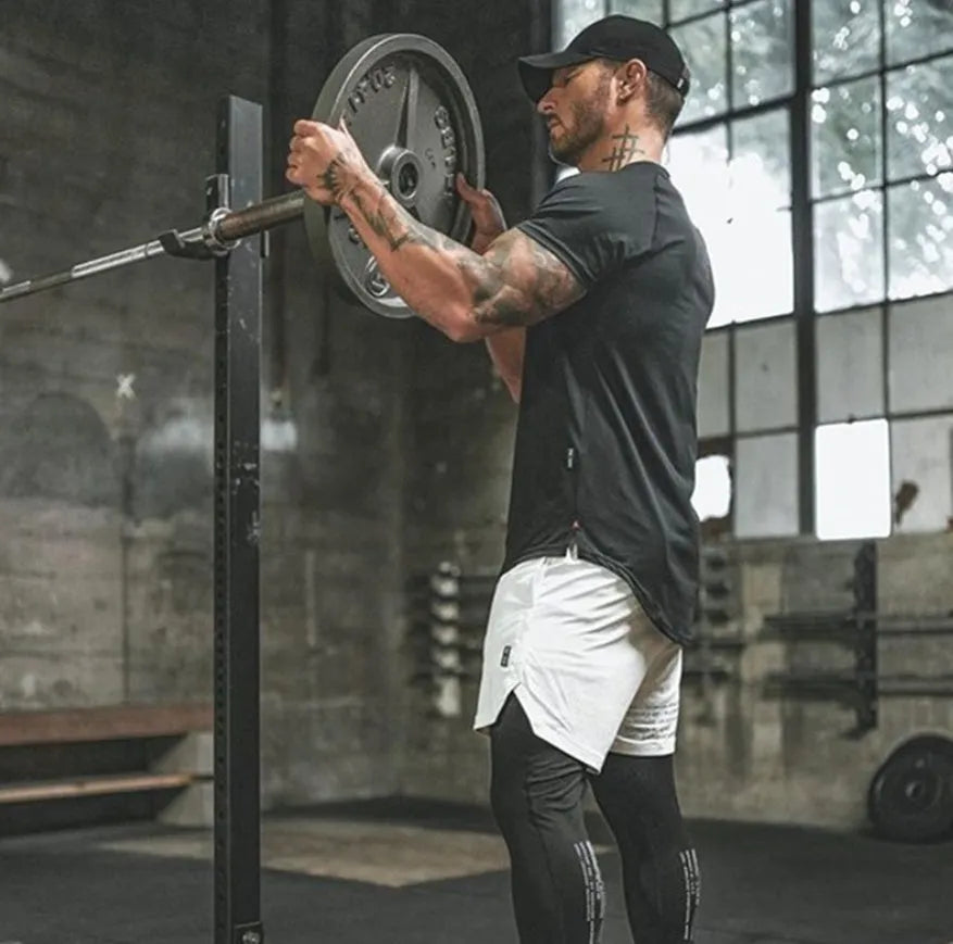 Men's plain gym shirt in cotton-spandex blend showing colour options and size range for fitness wear