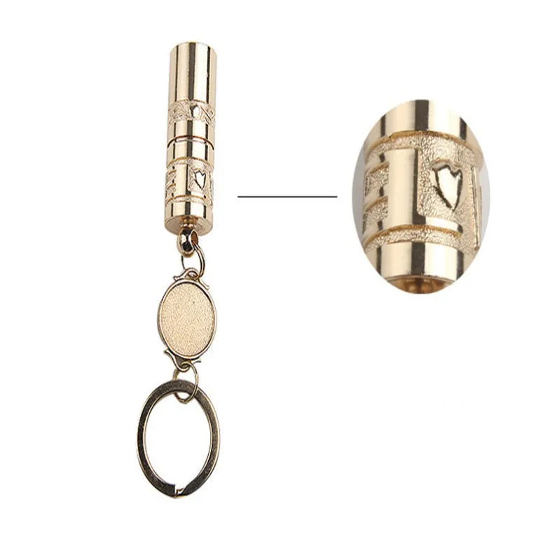 Gold-coloured waterproof zinc alloy portable LED flashlight on a keychain ring.