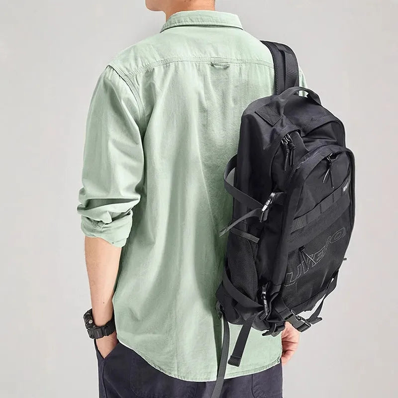 Men's loose-fitting long sleeve cardigan shirt in light grey, made from polyester fabric.