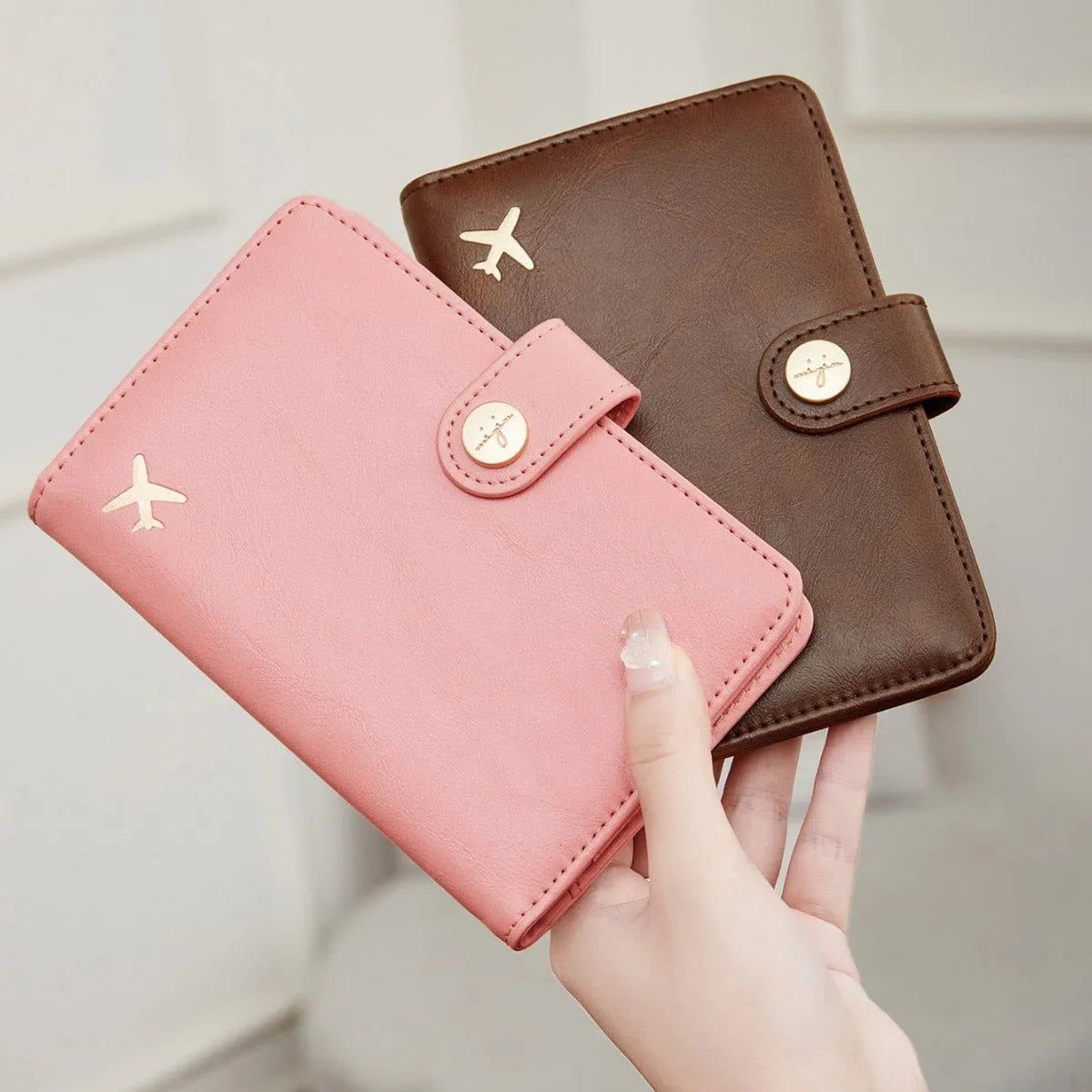 PU leather multifunctional passport holder wallet in various colours showing sewing line detail and anti-theft protection.