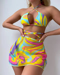 Yellow striped halter neck swimsuit set with lace-up front, skirt, and shorts for women