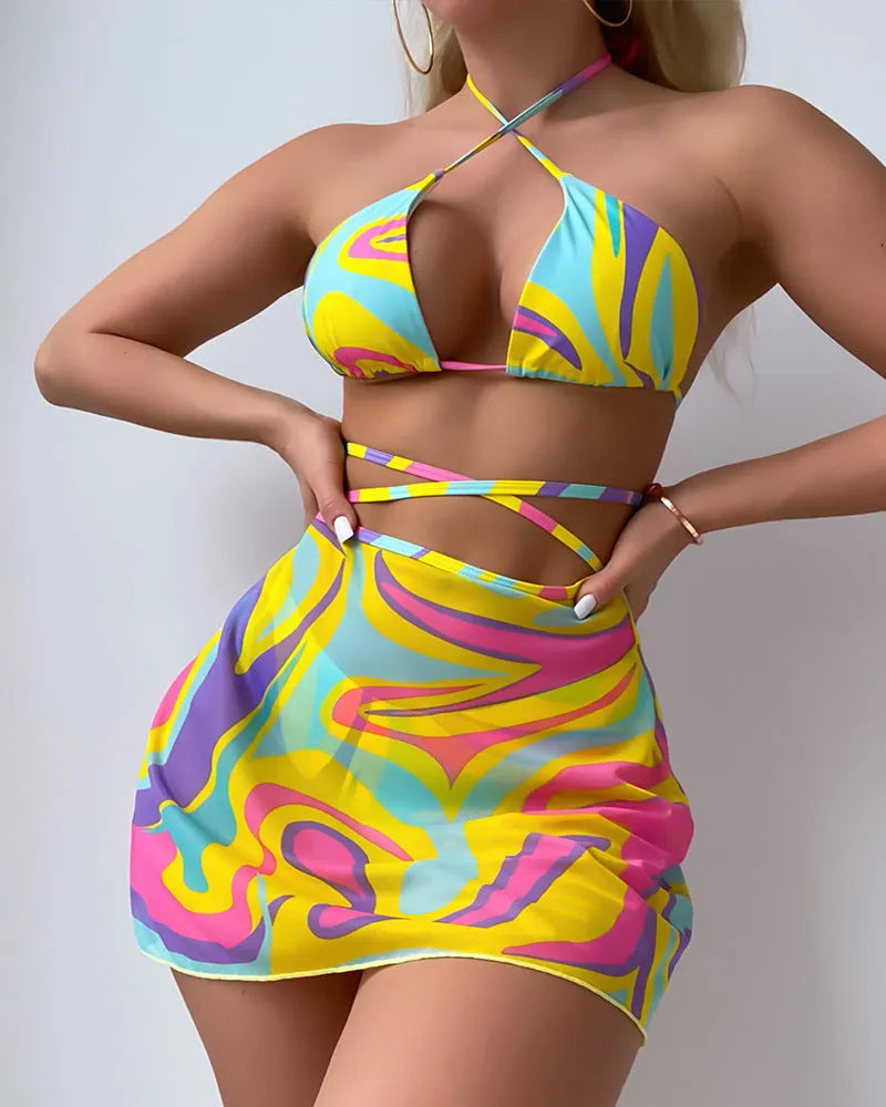 Yellow striped halter neck swimsuit set with lace-up front, skirt, and shorts for women