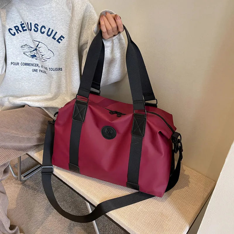36-55L waterproof Oxford cloth travel bag with breathable back panel in black, grey, red or blue colour