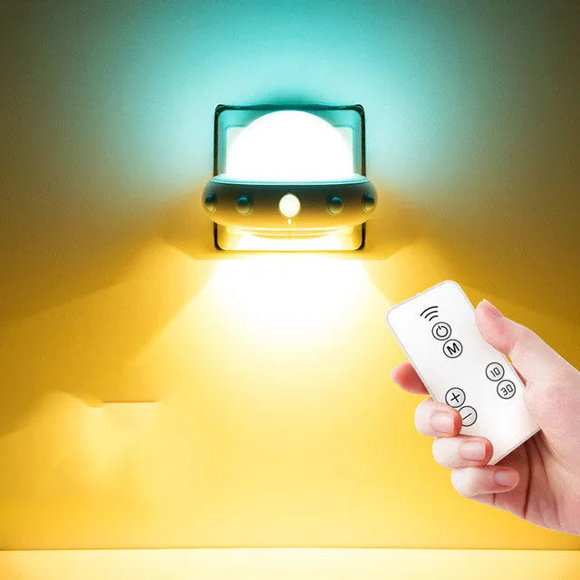 Blue remote control UFO shaped bedside night light with dimensions 105x76x58mm