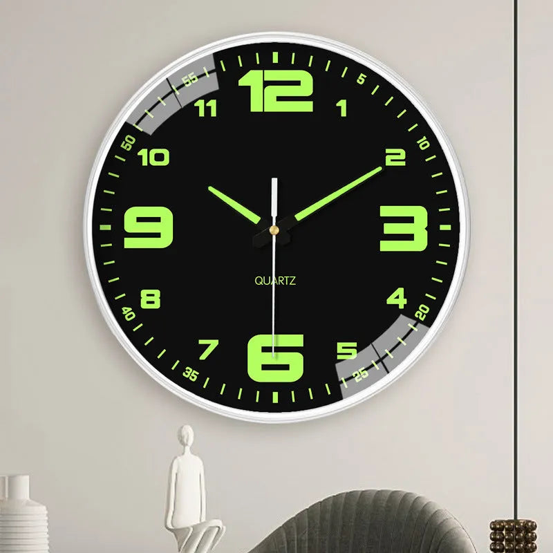 Modern 8-inch luminous wall clock with white plastic case on a wall.