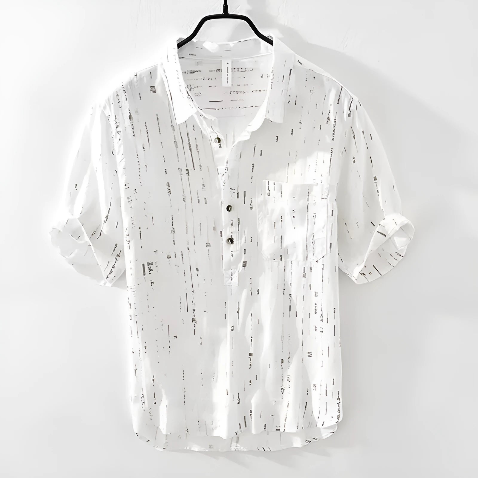 Men's loose-fit short-sleeved polo shirt in white, showing cardigan style and thin fabric.