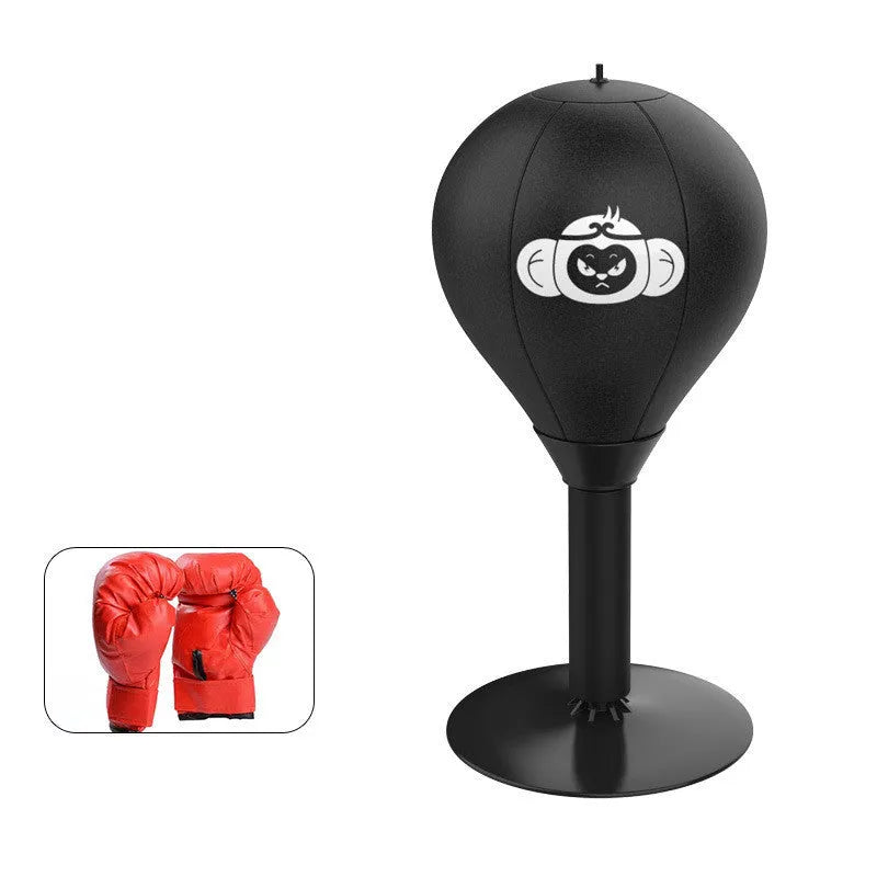 Tabletop boxing speed ball with suction cup base and PU leather inflatable sphere on a desk.