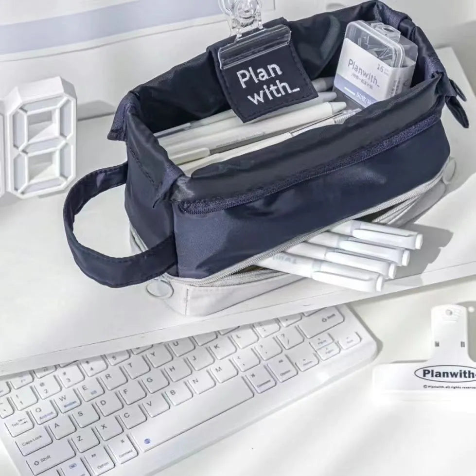 Polyester folding double layer pencil case in beige, blue or navy blue with organised compartments for stationery storage