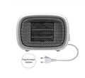Compact green portable heater with metal grille showing dimensions 158mm x 90mm x 114mm.