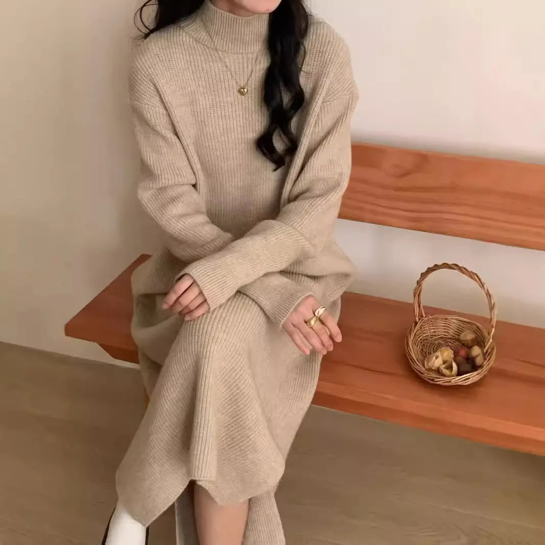 Acrylic half turtleneck knitted dress in graphite colour with high waist and overknee long length