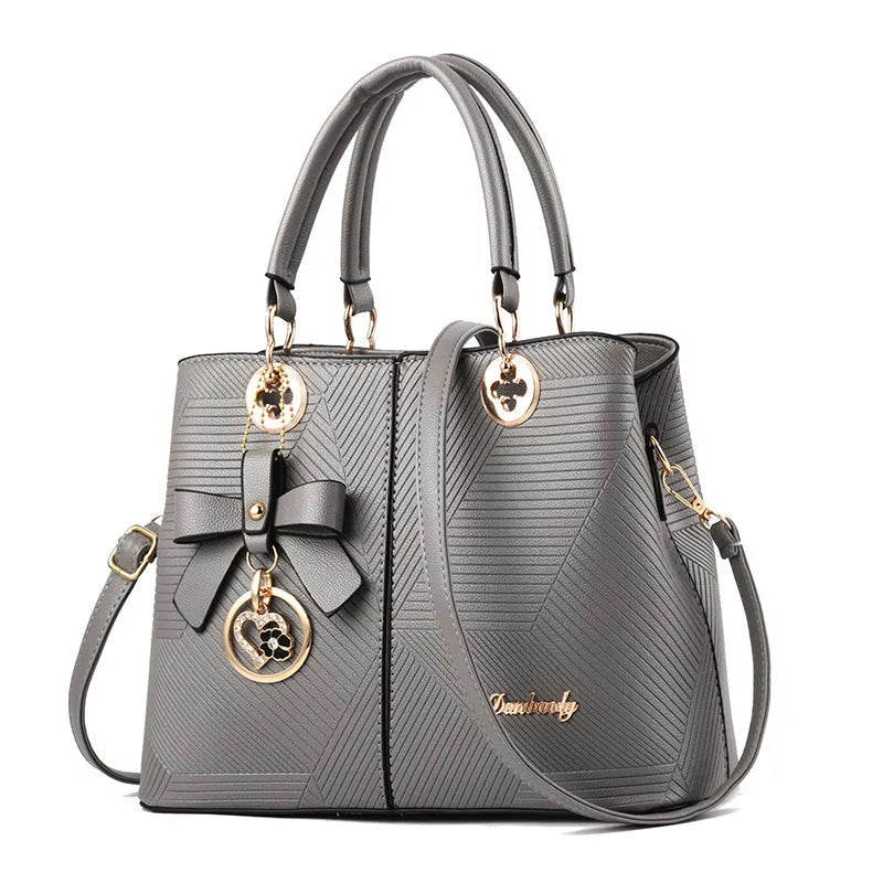 Retro PU leather handbag with shoulder strap and zipper closure in multiple colour options