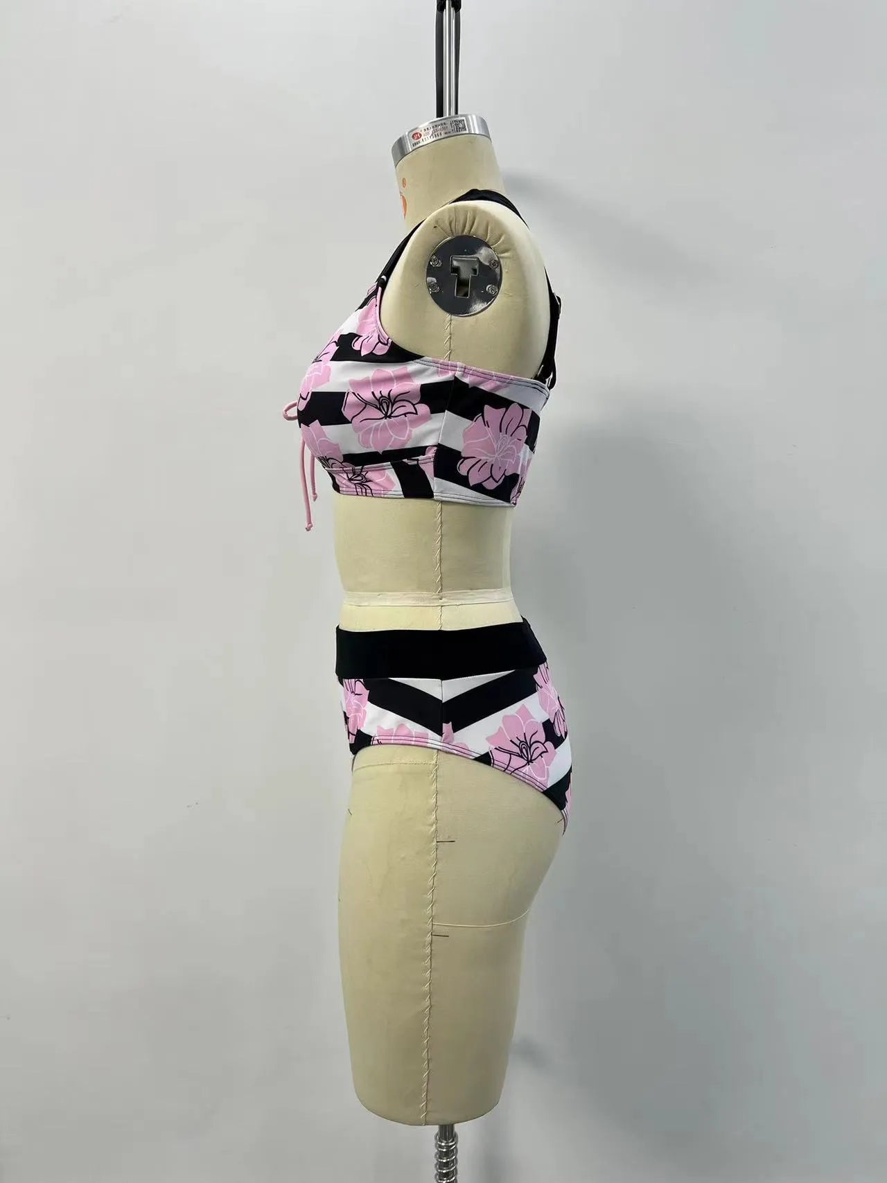 Black printed women's two-piece bikini with tummy control and split design