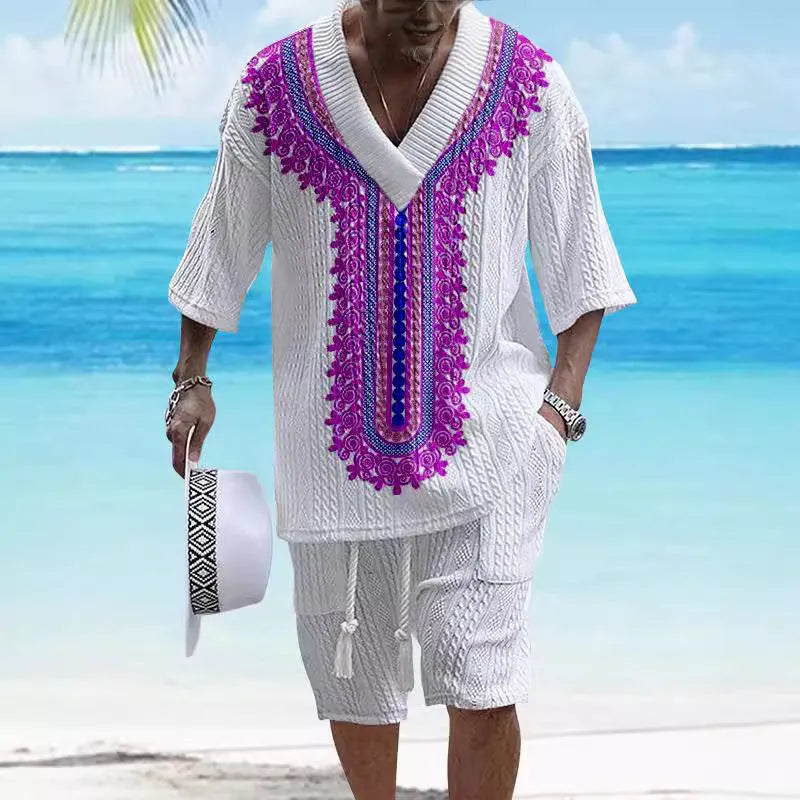 Man wearing a printed drop-shoulder knitted short-sleeve top with matching shorts, a casual summer suit set.