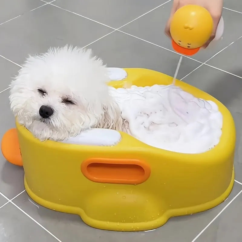 Blue duck-shaped PVC bathtub for washing a small dog or cat, non-electric and portable.