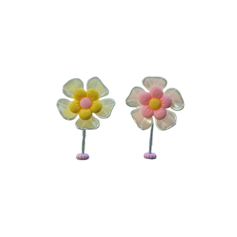 Plastic car decoration ornament with swing design in blue colour showing 5cm height measurement