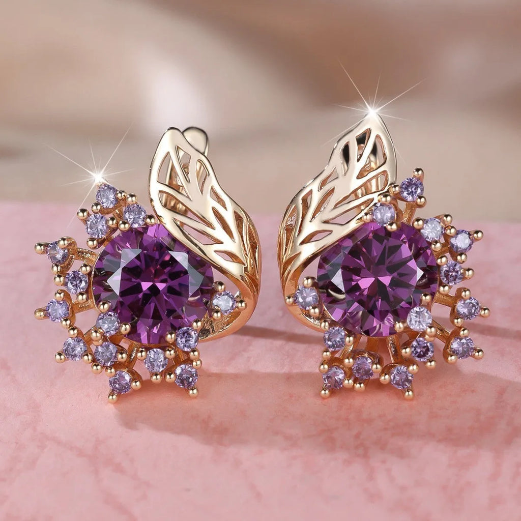 Round flower feather design earrings for women in champagne gold with colourful zircon stone accents.