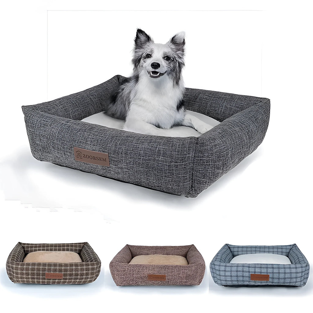 Square grey linen dog bed on a wooden floor for autumn and winter.