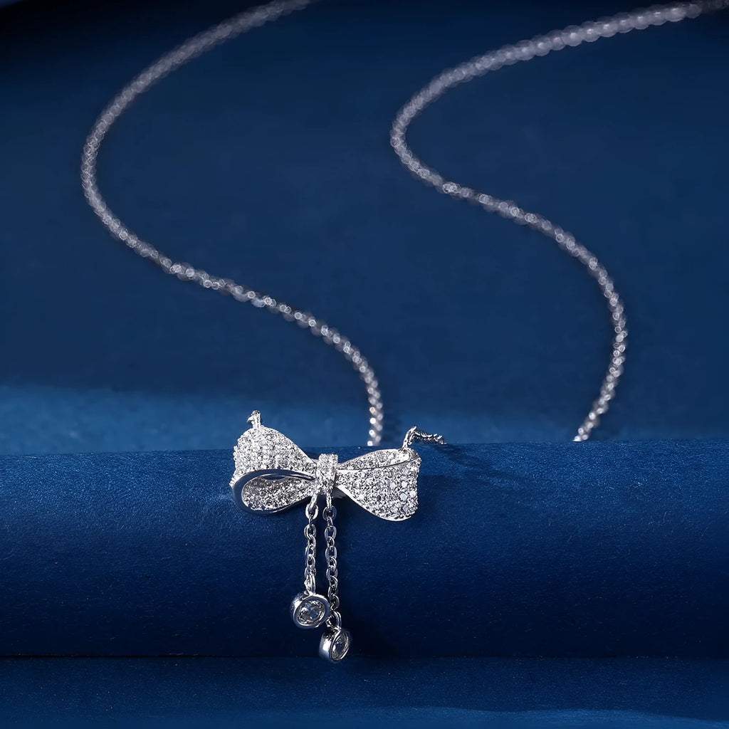 Sterling silver 925 necklace with bow pendant on O-ring chain, 40-45cm length