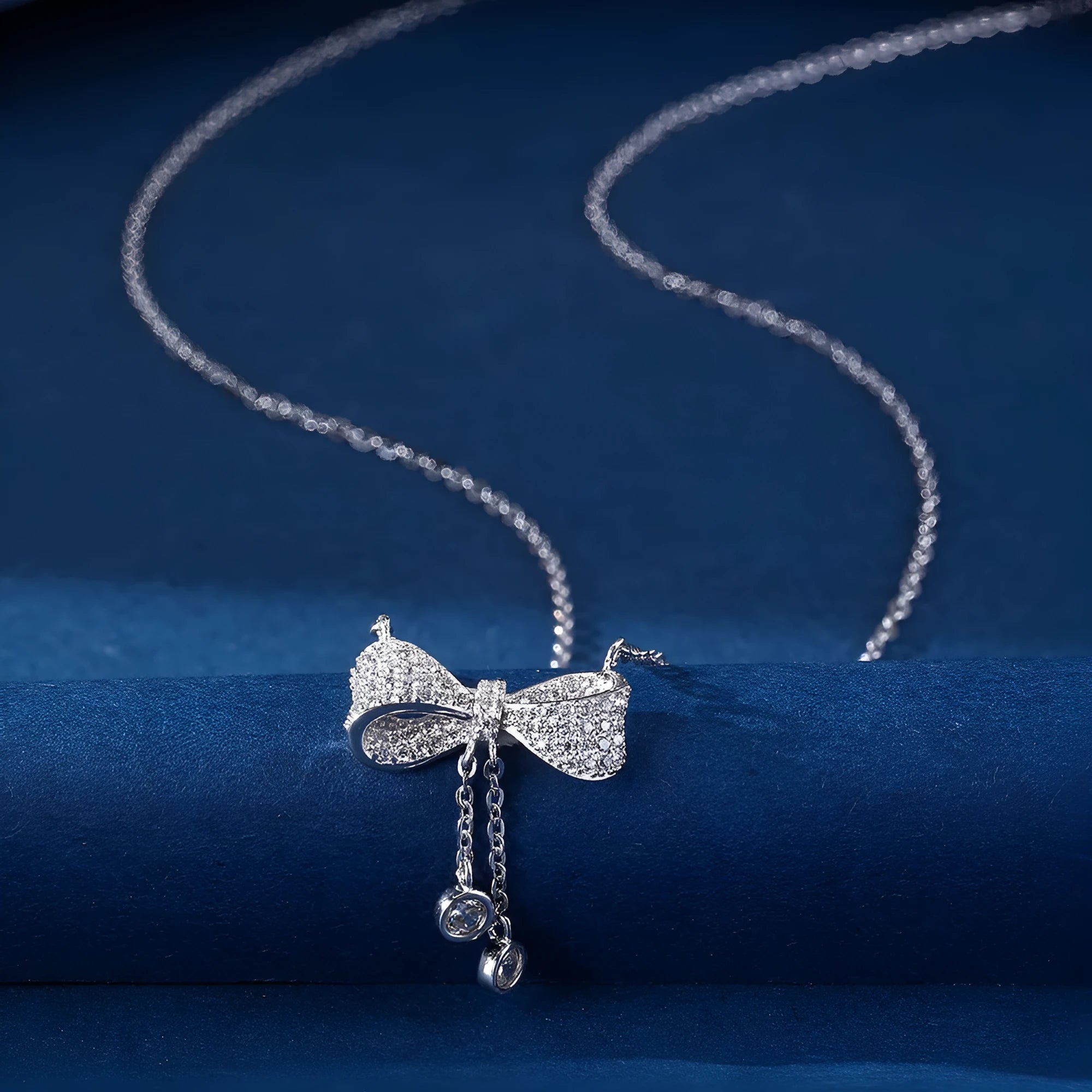 Sterling silver 925 necklace with bow pendant on O-ring chain, 40-45cm length