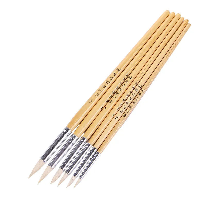 Six wooden-handled artist pen brushes with pointed wool hooks for detailed line work.