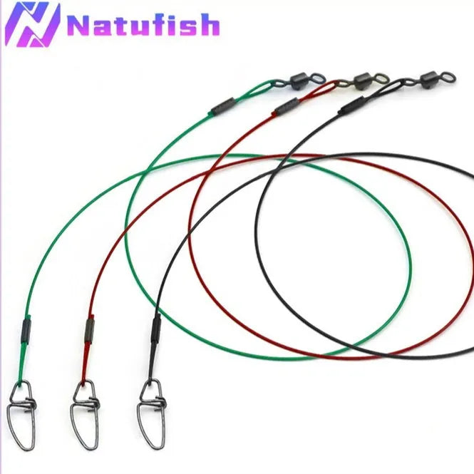 Ten green steel wire double buckle fishing leader pins laid out, each 54 cm long.