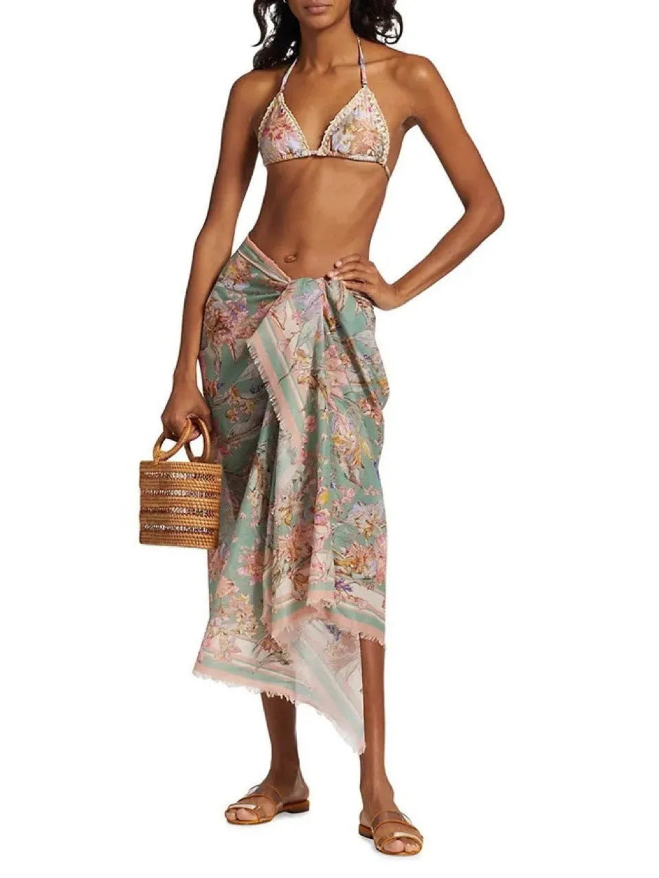 Women's floral pattern bikini set with briefs and matching skirt in creamy-white colour