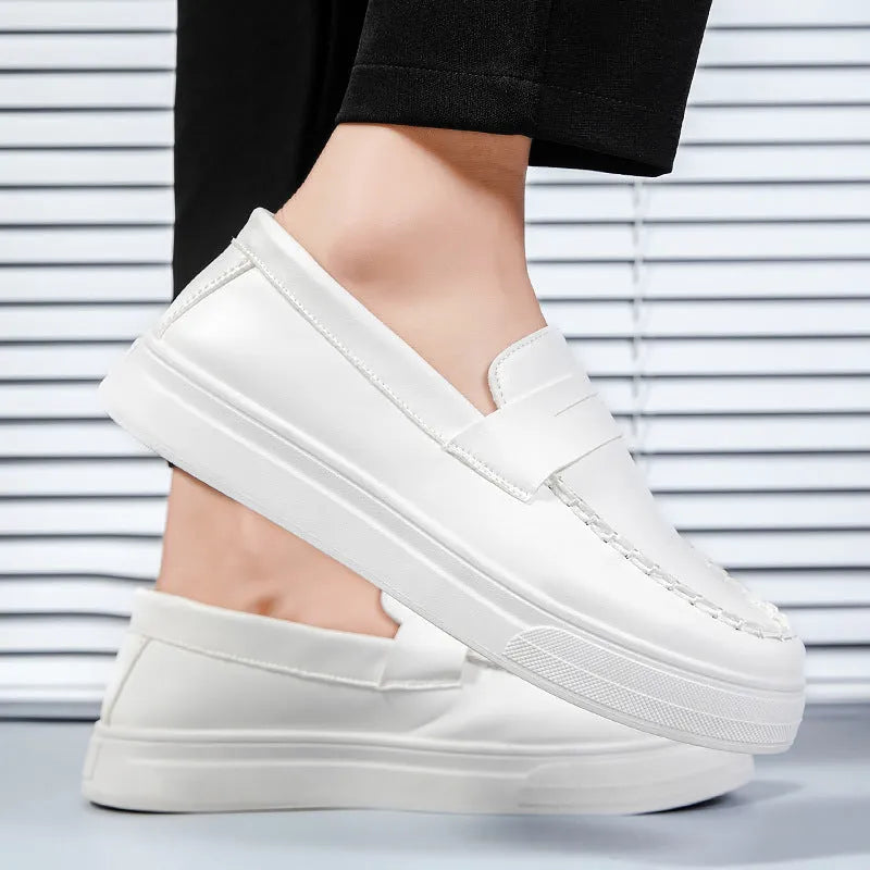 PU artificial leather slip-on casual shoes in white, shown in a side view on a neutral background.